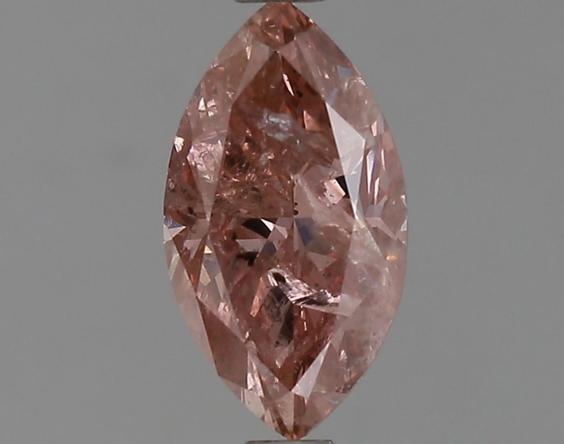 Natural 1.02 ct, Color Brownish Pink/ GIA Graded Diamond: Lab/Natural Diamond: Natural Carat Weight: 1.02 Color Grade: Brownish Pink Clarity Grade: Model: Marquise Brilliant Size: 9.41 x 5.12 x 3.53 Certificate Number: 2215309587 Certified By: GIA To View a