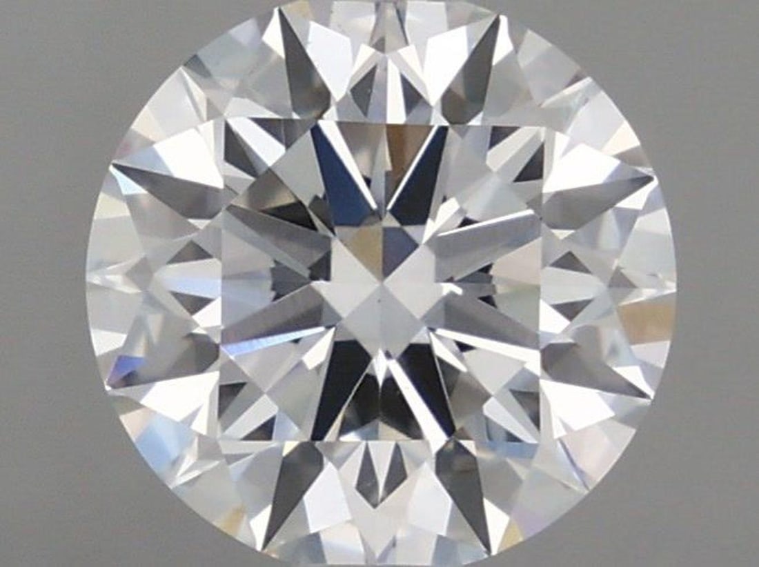 Lab Grown 1.55 ct, Color E/VS1 IGI Graded Diamond: Lab/Natural Diamond: Lab Carat Weight: 1.55 Color Grade: E Clarity Grade: VS1 Model: Round Fluorescence: None Polish: Excellent Symmetry: Excellent Depth: 58 Table: 61.8 Cut Grade: Ideal Size: 7.38-7.