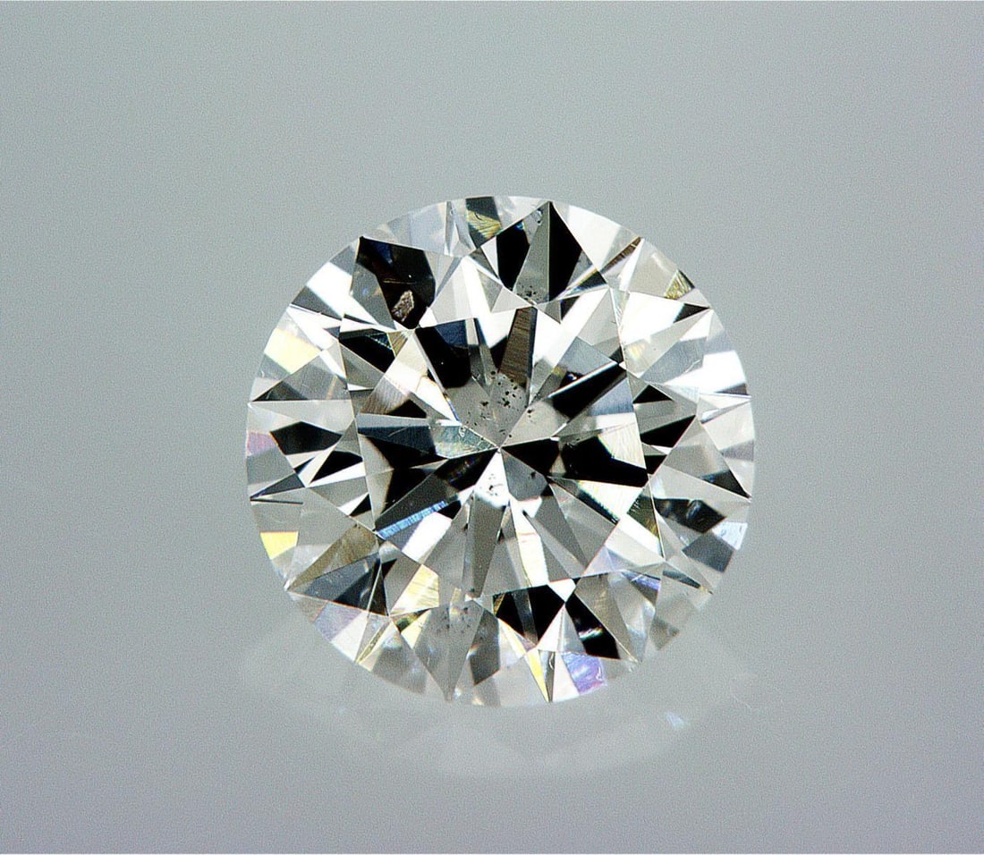 Natural 1.51 ct, Color F/SI1 GIA Graded Diamond: Lab/Natural Diamond: Natural Carat Weight: 1.51 Color Grade: F Clarity Grade: SI1 Model: Round Brilliant Fluorescence: None Polish: Excellent Symmetry: Excellent Cut Grade: Excellent Size: 7.39 - 7.43