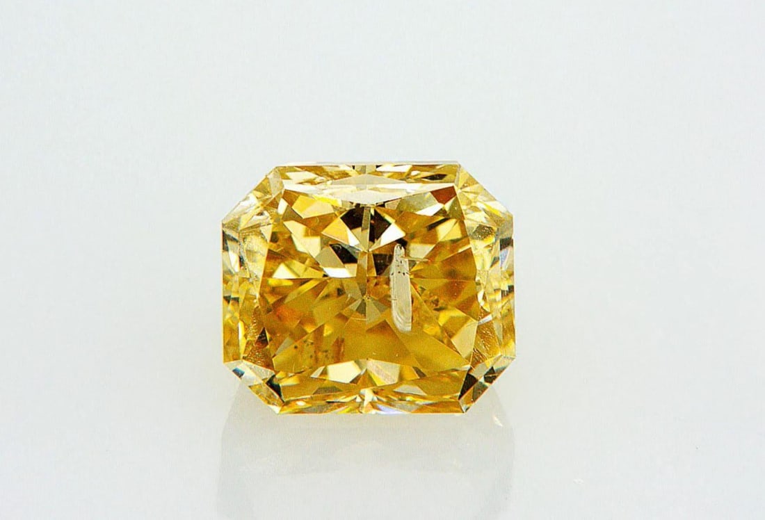 Natural 1.51 ct, Color Fancy Brownish Yellow/ GIA Graded Diamond: Lab/Natural Diamond: Natural Carat Weight: 1.51 Color Grade: Fancy Brownish Yellow Clarity Grade: Model: Cut-Cornered Rectangular Size: 6.33 x 5.52 x 4.58 Certificate Number: 2235170613 Certified By: