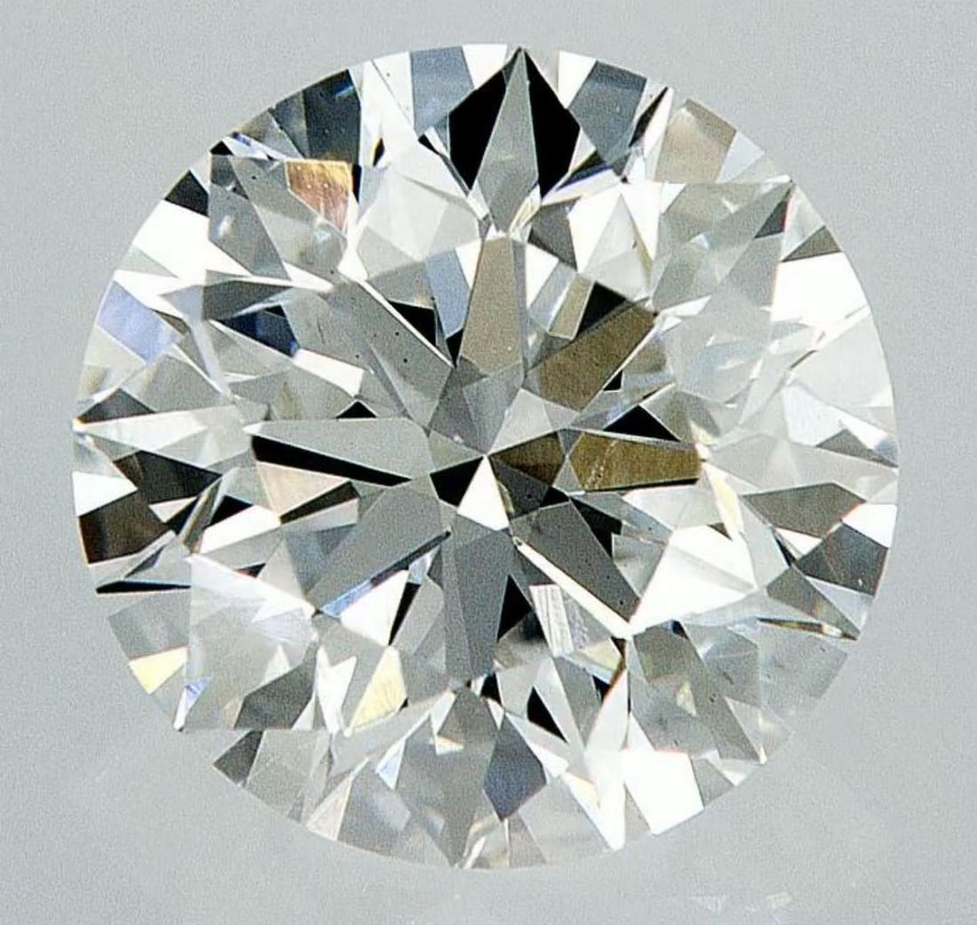 Lab Grown 1.56 ct, Color E/VS1 IGI Graded Diamond: Lab/Natural Diamond: Lab Carat Weight: 1.56 Color Grade: E Clarity Grade: VS1 Model: Round Brilliant Fluorescence: None Polish: Excellent Symmetry: Excellent Cut Grade: Excellent Size: 7.39 - 7.44 X 4