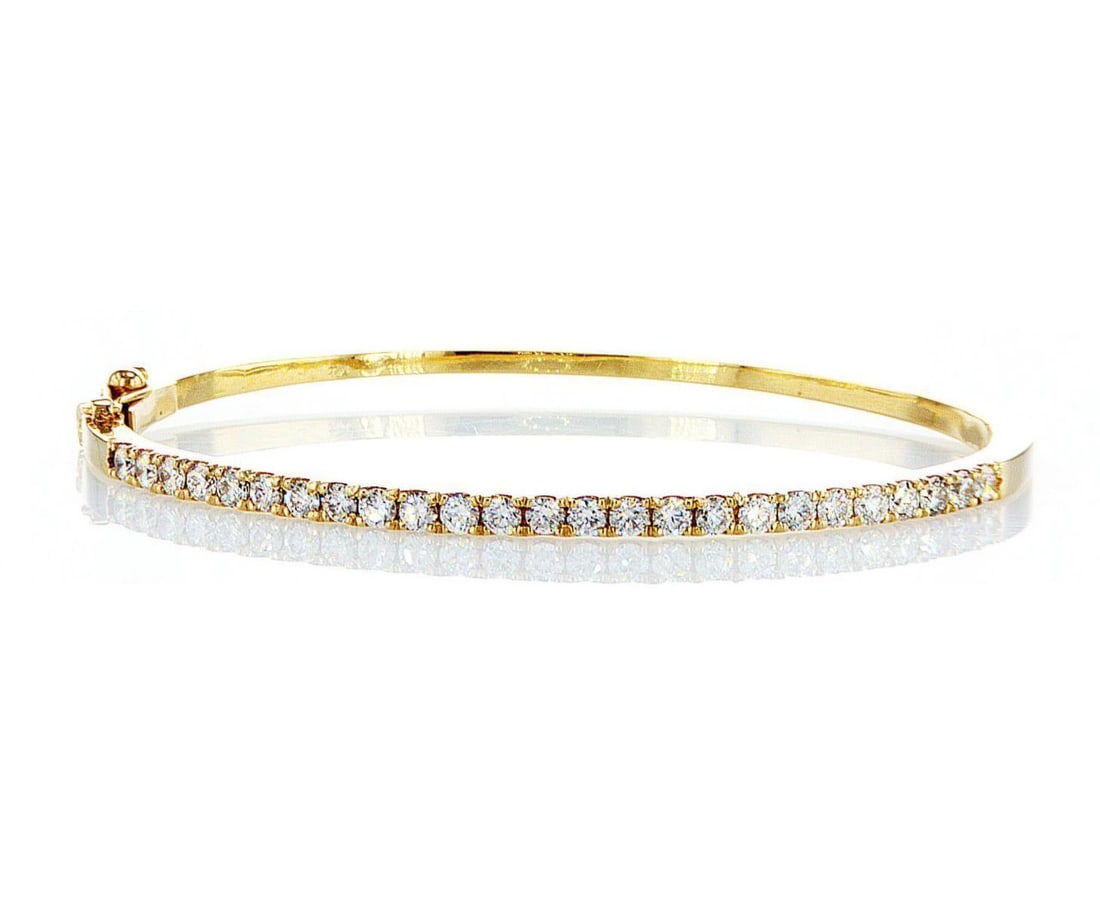 14kt Yellow Gold 1.86ctw Diamond Bangle: Jewelry Description Description: One 14k yellow gold bangle, set with lab grown diamonds. Jewelry Weight: 14.17 Grs Total Diamonds Weight: 1.86 Cts Precious Metal: 14kt Yellow Gold Certificate Number: