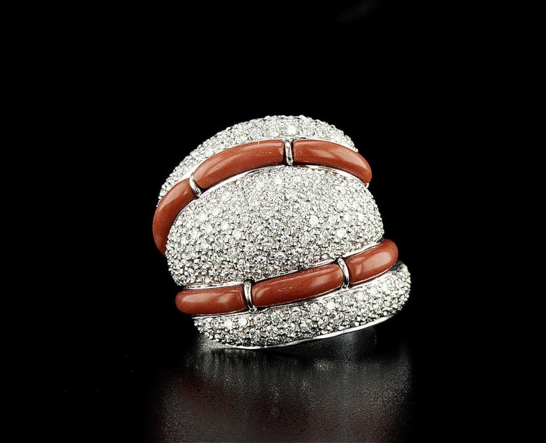 18kt White Gold 1.28ctw Diamond Ring: One 18k white gold ring (750 stamped), set with coral and natural diamonds. Jewelry Weight: 16.91Grs Total Diamonds Weight: 1.28Cts Main Stones Description: Cut and shape: Round Brilliant Carats Weigh