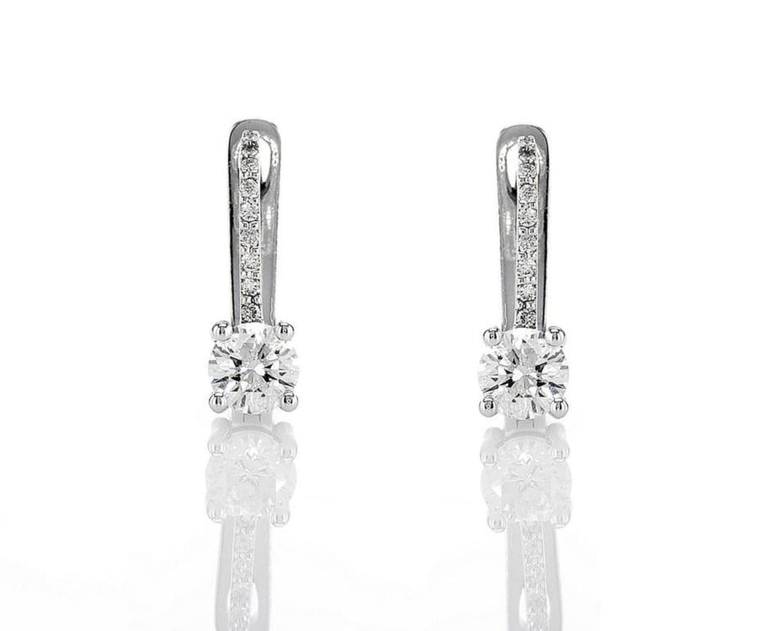 14kt White Gold 1.17ctw Diamond Earrings: Jewelry Description Description: One pair of 14k white gold earrings, set with natural diamonds. Jewelry Weight: 3.54 Grs Total Diamonds Weight: 1.17 Cts Precious Metal: 14kt White Gold Certificate Nu