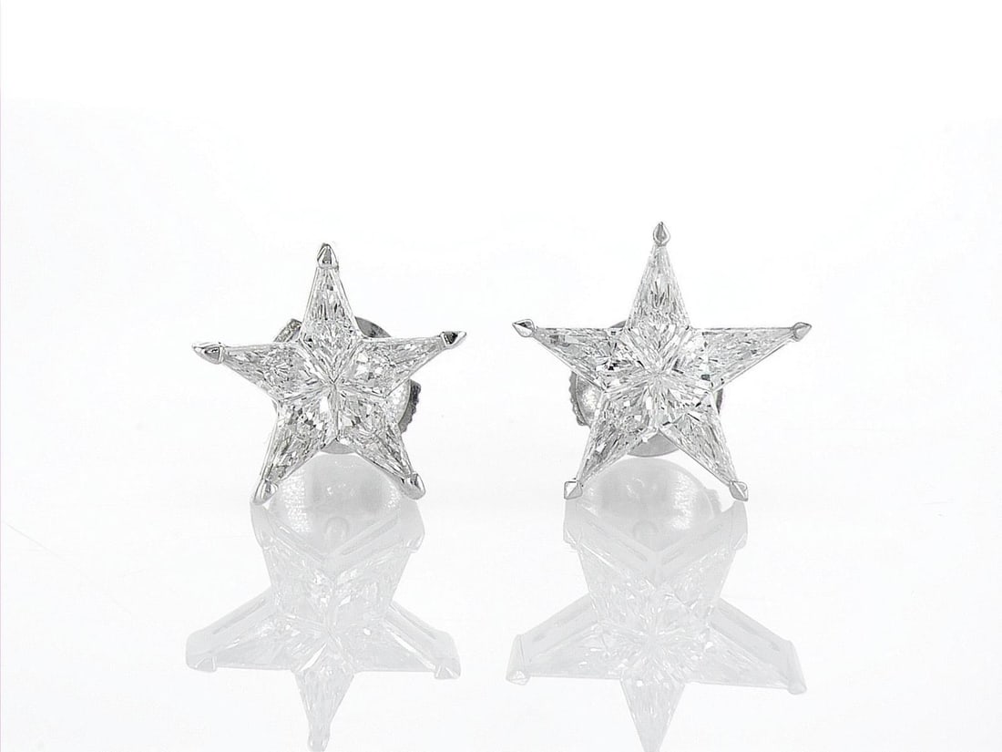 18kt White Gold 1.45ctw Diamond Earrings: One pair of 18k white gold earrings (18k stamped), each set with five natural diamonds. Jewelry Weight: 2.63Grs Total Diamonds Weight: 1.45Cts Main Stones Description: Quantity: 10 Cut and shape: Nobl