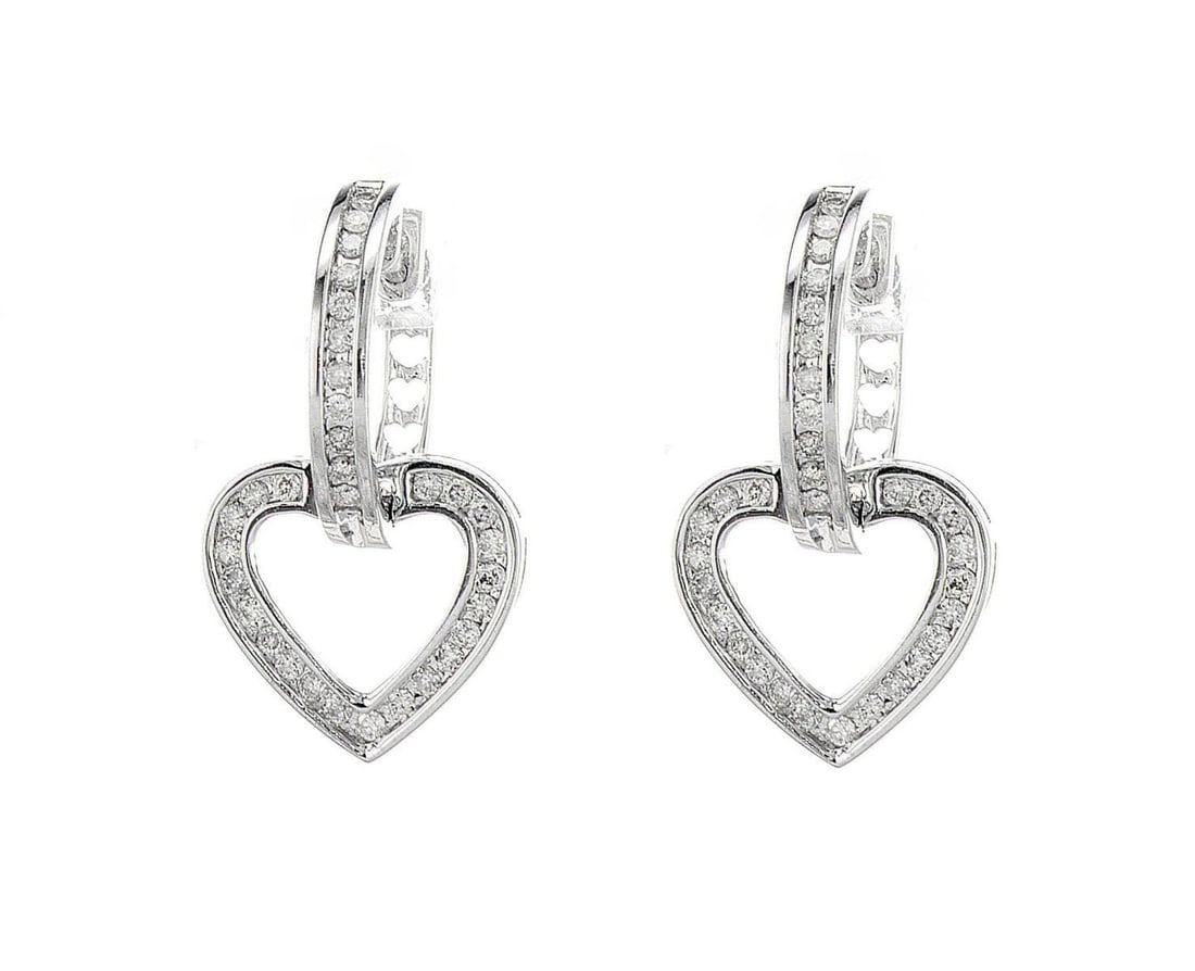 18kt White Gold 0.47ctw Diamond Earrings: One pair of 18k white gold earrings, set with natural diamonds. Jewelry Weight: 4.88Grs Total Diamonds Weight: 0.47Cts Main Stones Description: Quantity: 64 Cut and shape: Round Brilliant Carats Weigh