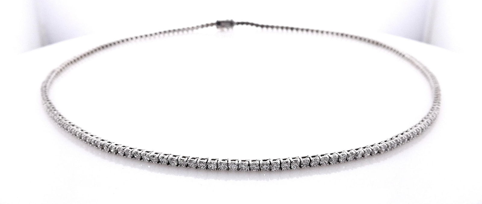 14kt White Gold 3.9ctw Diamond Collar: Jewelry Description Description: One 14k white gold collar, set with lab grown diamonds. Jewelry Weight: 13.79 Grs Total Diamonds Weight: 3.9 Cts Precious Metal: 14kt White Gold Certificate Number: DS