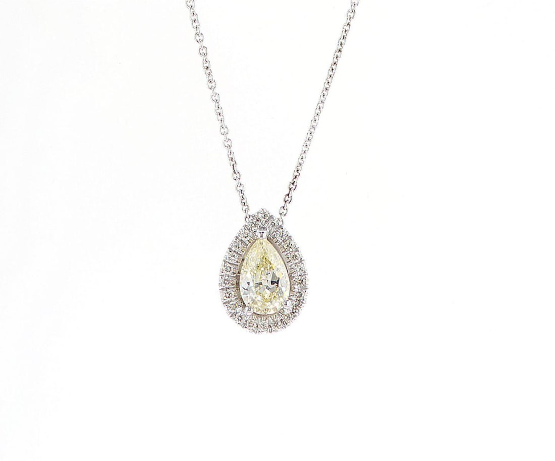 14kt White Gold 1.28ctw Diamond Pendant: Jewelry Description Description: One 14k white gold pendant, set with natural diamonds. Jewelry Weight: 3.34 Grs Total Diamonds Weight: 1.28 Cts Precious Metal: 14kt White Gold Certificate Number: DSL