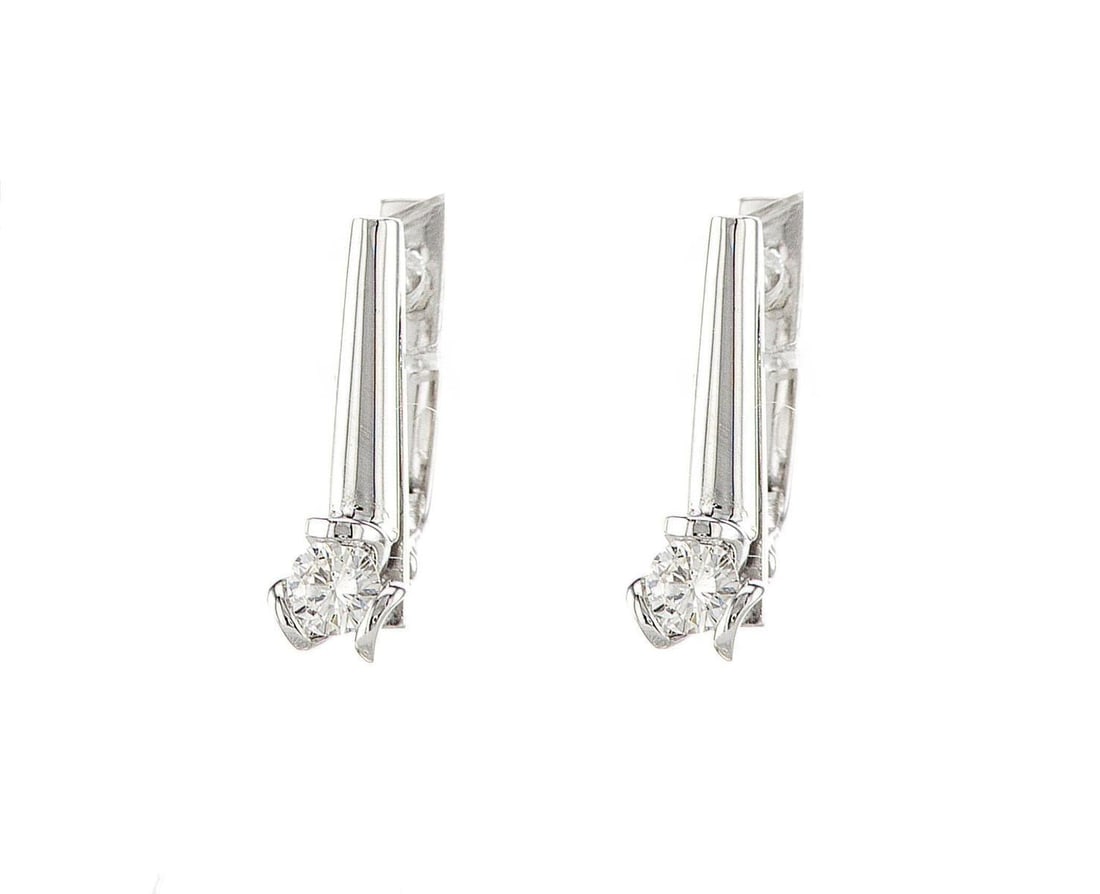 14kt White Gold 0.4ctw Diamond Earrings: One pair of 14k white gold earrings, set with natural diamonds. Jewelry Weight: 4.43Grs Total Diamonds Weight: 0.4Cts Main Stones Description: Quantity: 2 Cut and shape: Round Brilliant Carats Weight: