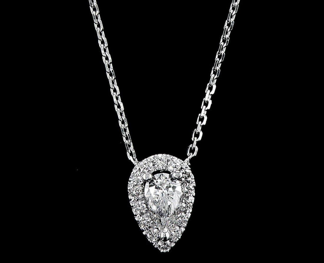 14kt White Gold 0.45ctw Diamond Pendant: One 14k white gold pendant with chain (14k stamped), set with one center natural diamond and small natural diamonds around. Jewelry Weight: 2.12Grs Total Diamonds Weight: 0.45Cts Main Stones Descripti