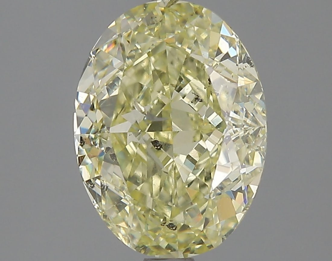 Natural 3.07 ct, Color Fancy Light Yellow/ GIA Graded Diamond: Lab/Natural Diamond: Natural Carat Weight: 3.07 Color Grade: Fancy Light Yellow Clarity Grade: Model: Oval Modified Brilliant Size: 10.16 x 7.56 x 5.01 Certificate Number: 2205798496 Certified By: GIA