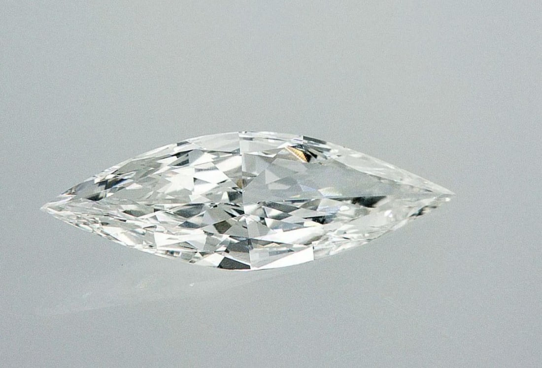 Lab Grown 1.51 ct, Color E/VS1 IGI Graded Diamond: Lab/Natural Diamond: Lab Carat Weight: 1.51 Color Grade: E Clarity Grade: VS1 Model: MARQUISE Fluorescence: None Polish: Excellent Symmetry: Excellent Depth: 61.4 Table: 60 Size: 11.4-6.14*3.77 Certif