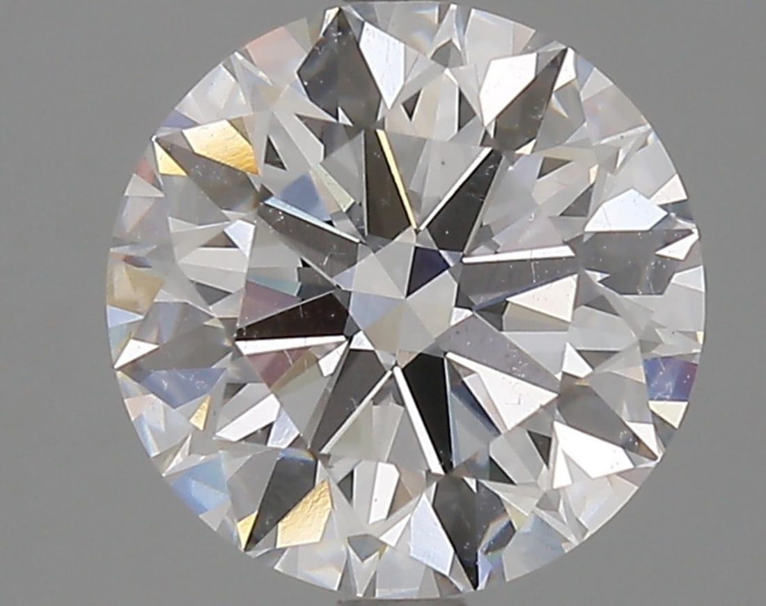 Lab Grown 3.01 ct, Color E/VS1 IGI Graded Diamond: Lab/Natural Diamond: Lab Carat Weight: 3.01 Color Grade: E Clarity Grade: VS1 Model: Round Brilliant Fluorescence: None Polish: Excellent Symmetry: Excellent Cut Grade: Excellent Size: 9.15 - 9.23 X 5