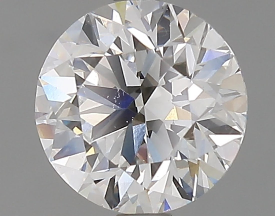Lab Grown 1.52 ct, Color E/VS1 IGI Graded Diamond: Lab/Natural Diamond: Lab Carat Weight: 1.52 Color Grade: E Clarity Grade: VS1 Model: Round Brilliant Polish: Excellent Symmetry: Excellent Cut Grade: Excellent Size: 7.27 - 7.31 X 4.61 Certificate Num