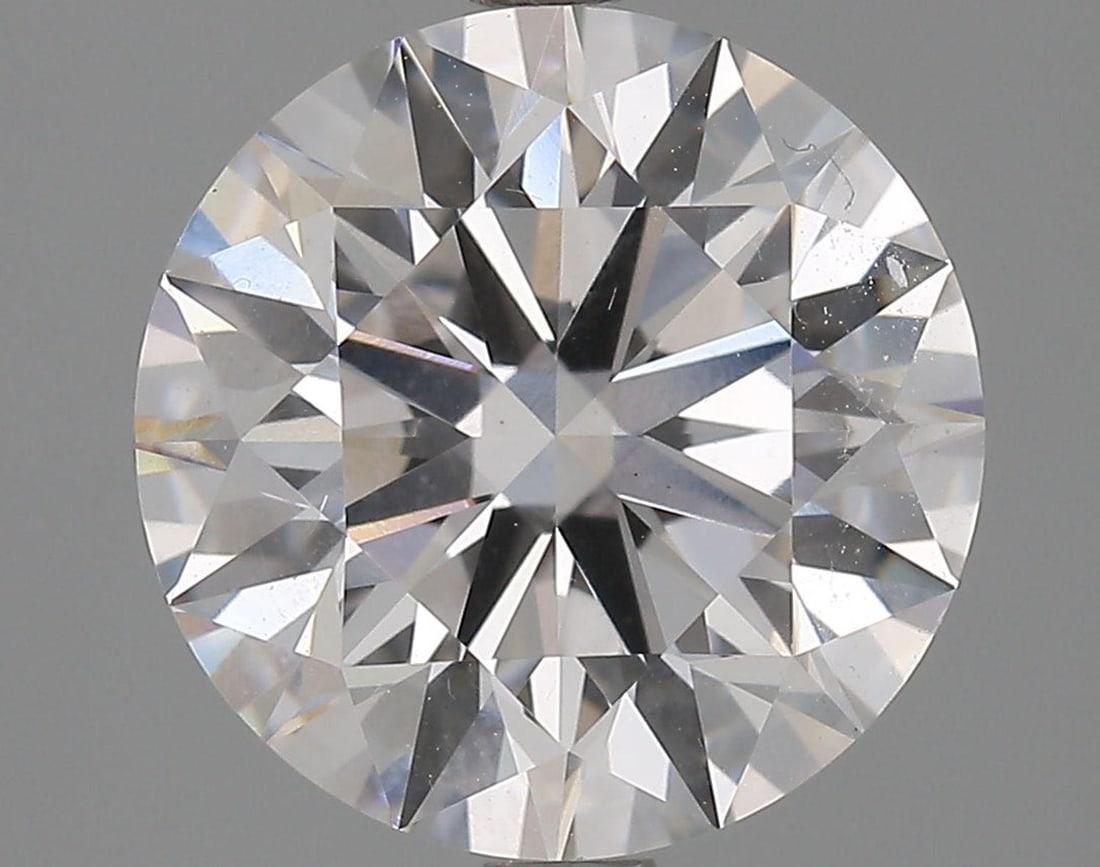 Lab Grown 3.6 ct, Color E/VS1 IGI Graded Diamond: Lab/Natural Diamond: Lab Carat Weight: 3.6 Color Grade: E Clarity Grade: VS1 Model: Round Brilliant Polish: Excellent Symmetry: Excellent Cut Grade: Ideal Size: 9.73 - 9.78 X 6.07 Certificate Number: