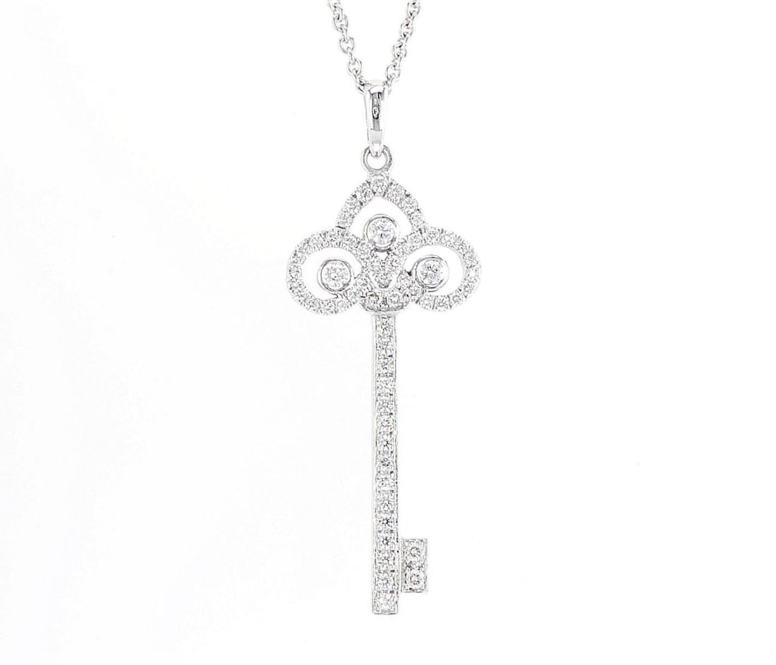 14kt White Gold 0.35ctw Diamond Pendant: Jewelry Description Description: One 14k white gold pendant, set with natural diamonds. Jewelry Weight: 3.38 Grs Total Diamonds Weight: 0.35 Cts Precious Metal: 14kt White Gold Certificate Number: DSL