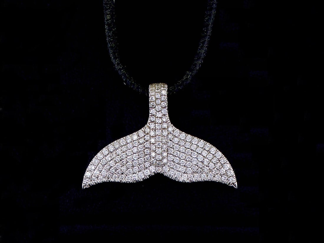 14kt White Gold 2.46ctw Diamond Pendant: One 14k white gold pendant with cord, set with natural diamonds. Natural diamonds description: Cut and shape: Round Brilliant. Total Weight: 2.46 cts. Cut/polish/symmetry: Excellent/Excellent/Excellen