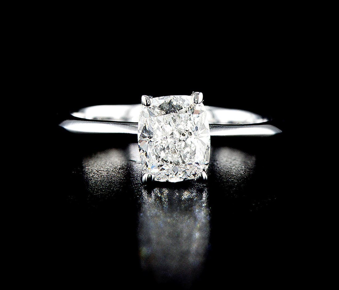 14kt White Gold 1.51ctw Diamond Ring: One 14k white gold ring Jewelry Weight: Grs Total Diamonds Weight: 1.51Cts Main Stones Description: Quantity: 1 Cut and shape: Cushion Modified Brilliant Carats Weight: 1.51 Clarity: SI2 Color: G Poli