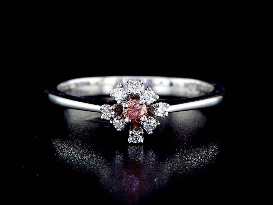 14kt White Gold 0.9ctw Diamond Ring: One 14k white gold ring (14k stamped), set with one center diamond and small natural diamonds around and on the sides. Natural diamonds description: Cut and shape: Round Brilliant. Quantity: 1 pcs. To