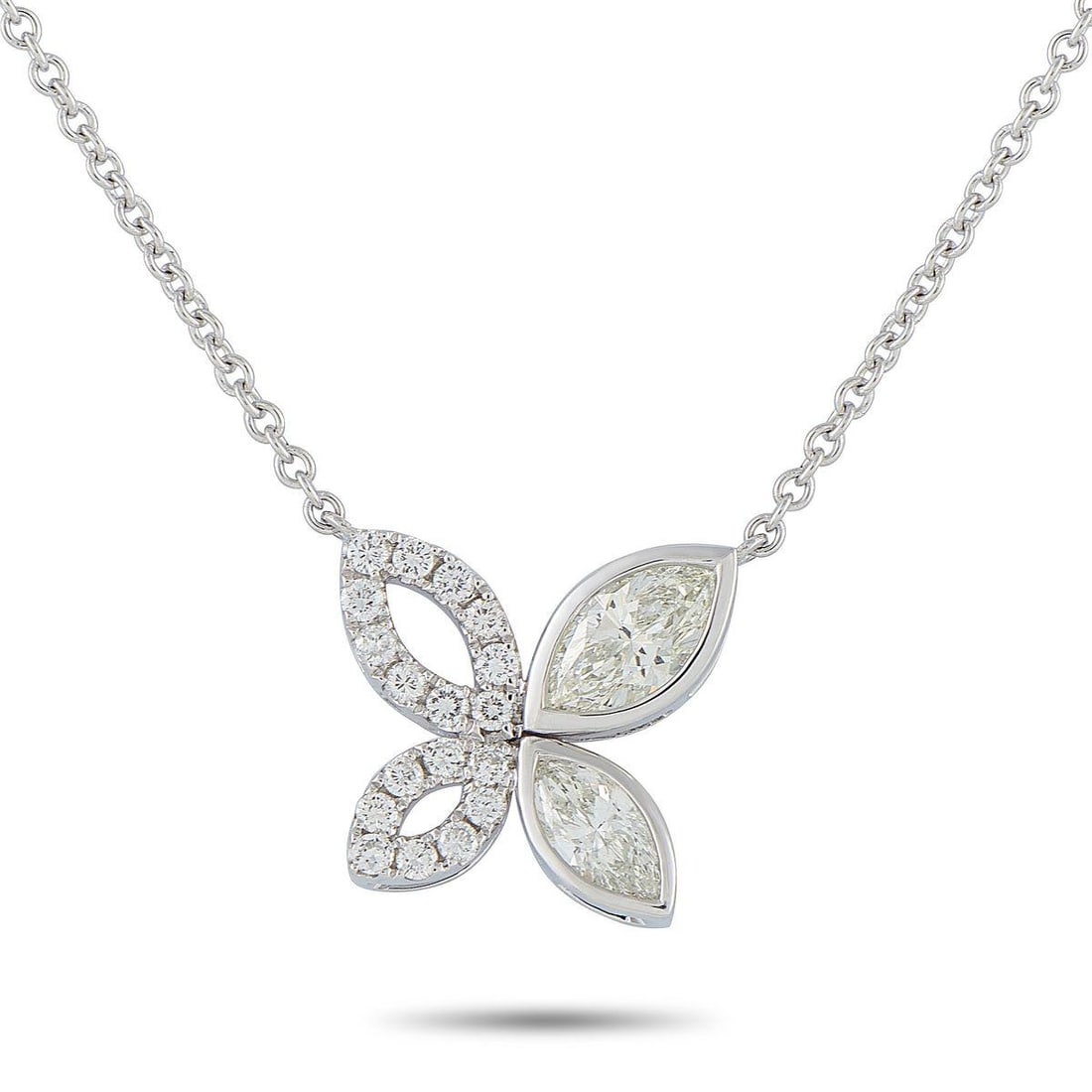 18K WHITE GOLD 1.62CT DIAMOND BUTTERFLY NECKLACE: Crafted in polished white gold, this butterfly necklace is defined by four marquise panels arranged into softly outspread wings. One side has two wings set with marquise-cut diamonds, secured in sleek