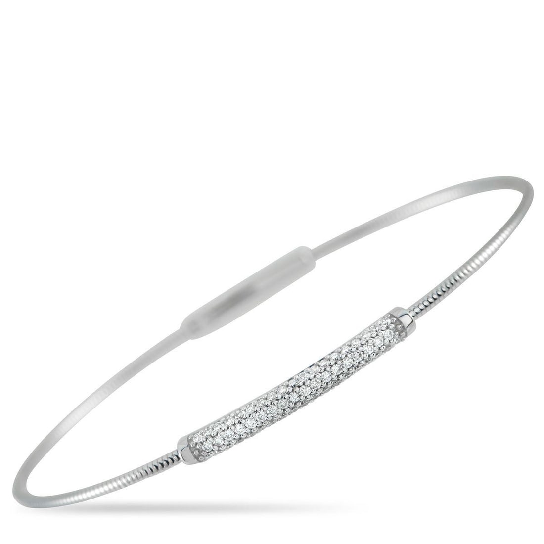 14K WHITE GOLD 0.37CT DIAMOND BRACELET: Designed as a rigid snake-chain bangle, this 14K white gold bracelet showcases an edgy, textured curve around the wrist. At its center sits a tube-like bar paved in diamonds, giving the piece a focuse
