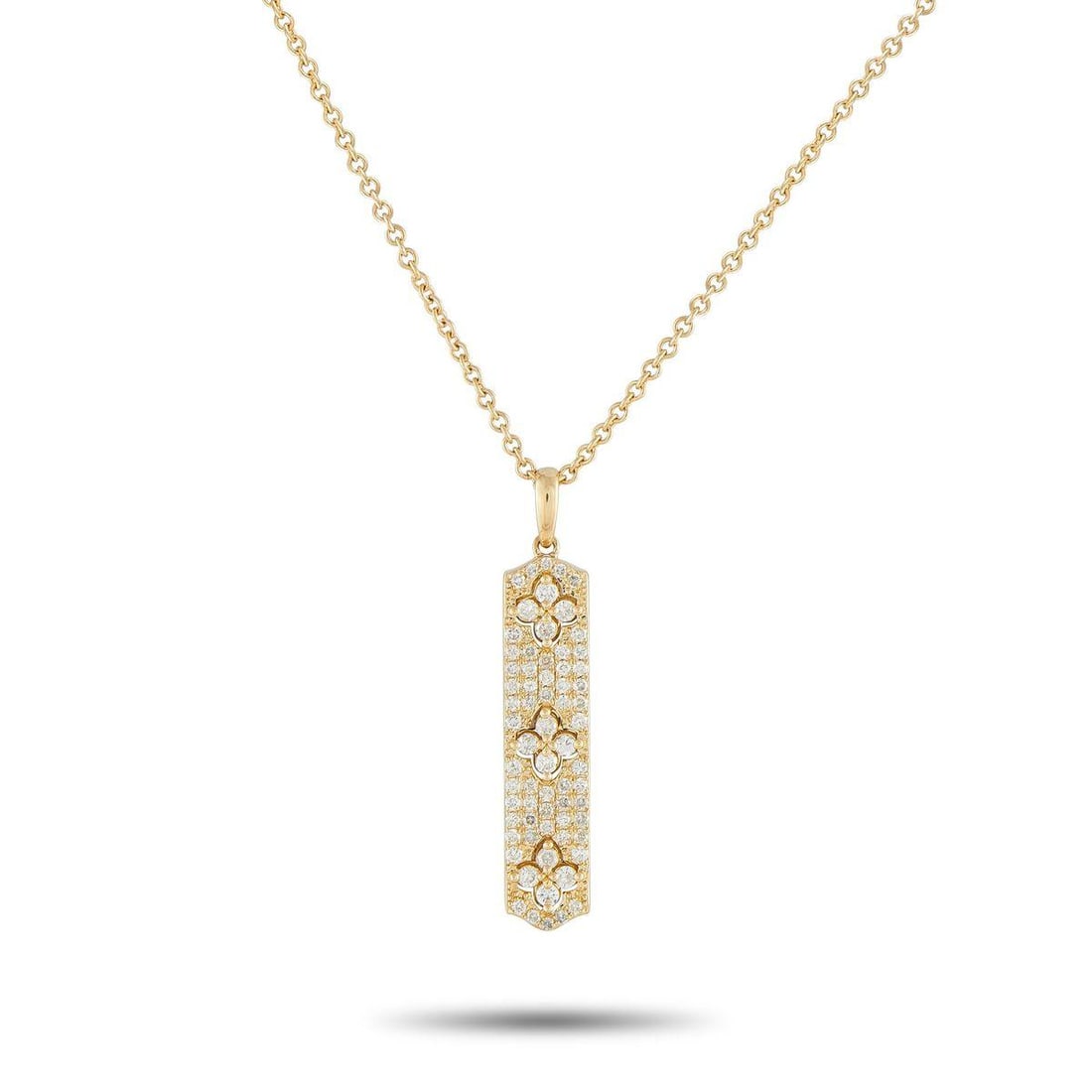 14K YELLOW GOLD 0.70CT DIAMOND PENDANT NECKLACE: Sparkling Diamonds totaling 0.70 carats make this 14K Yellow Gold necklace instantly eye-catching. The perfect piece for everyday wear, it features a detailed pendant measuring 1.38 long by 0.25 wide