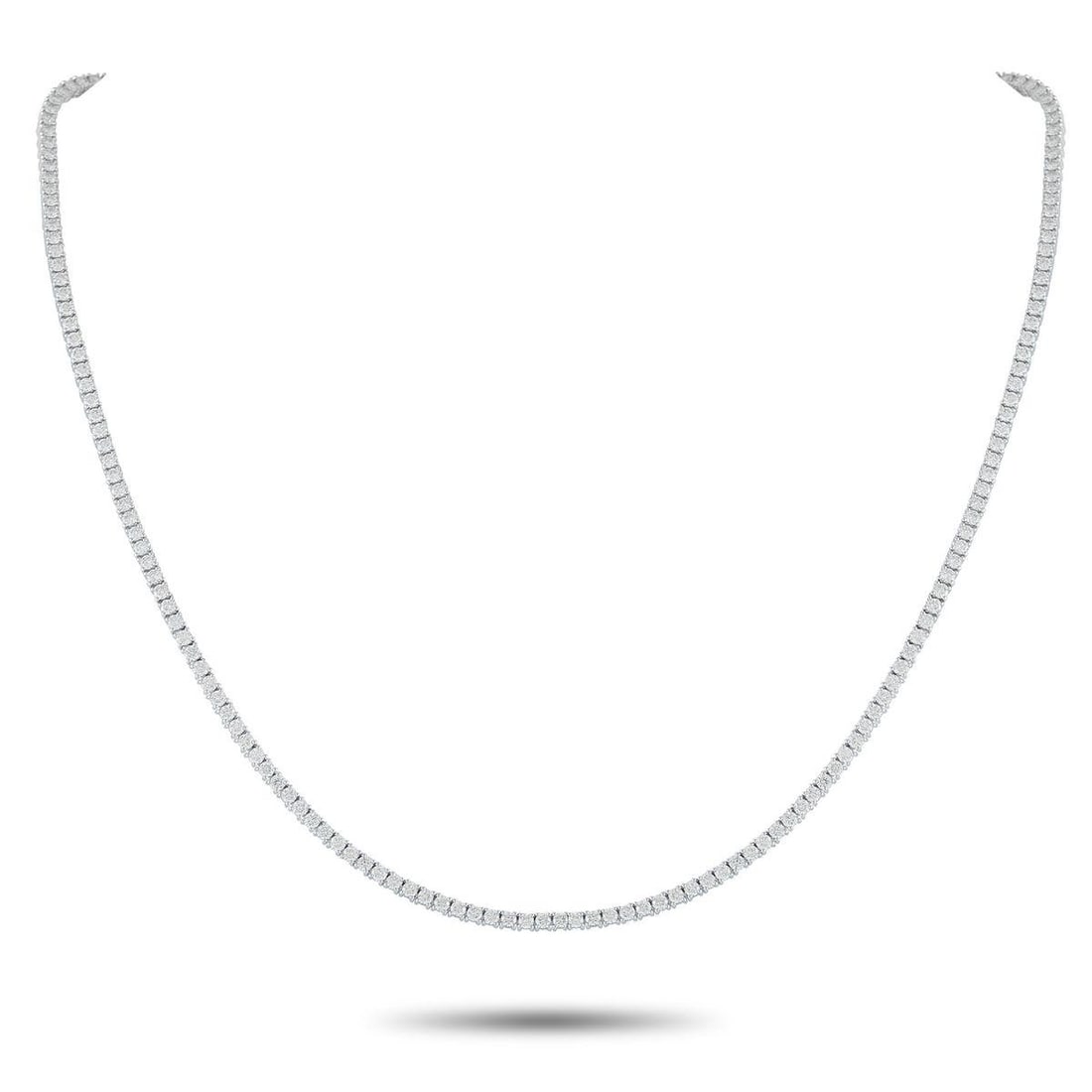 18K WHITE GOLD 5.78CT DIAMOND TENNIS NECKLACE: This sleek, sophisticated tennis necklace will never go out of style. Set in 18K White Gold, a series of sparkling Diamonds totaling 5.78 carats makes it a luxury piece that will effortlessly elevate