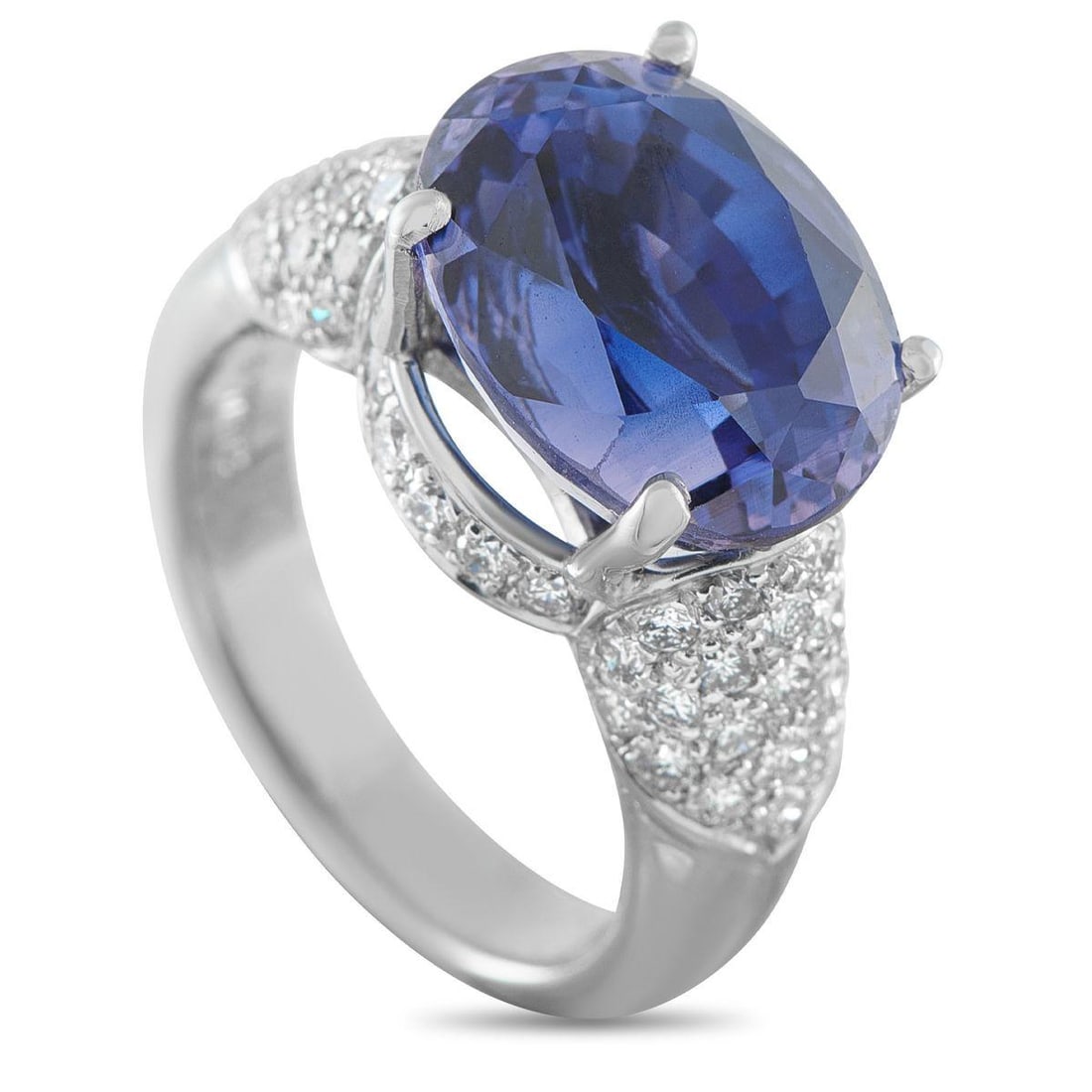 18K WHITE GOLD 1.10CT DIAMOND AND TANZANITE RING: This luxury ring is incredibly chic. At the center, a breathtaking 11.97 carat Tanzanite gemstone is suspended within the 18K White Gold setting. Diamond accents totaling 1.10 carats put the perfect f