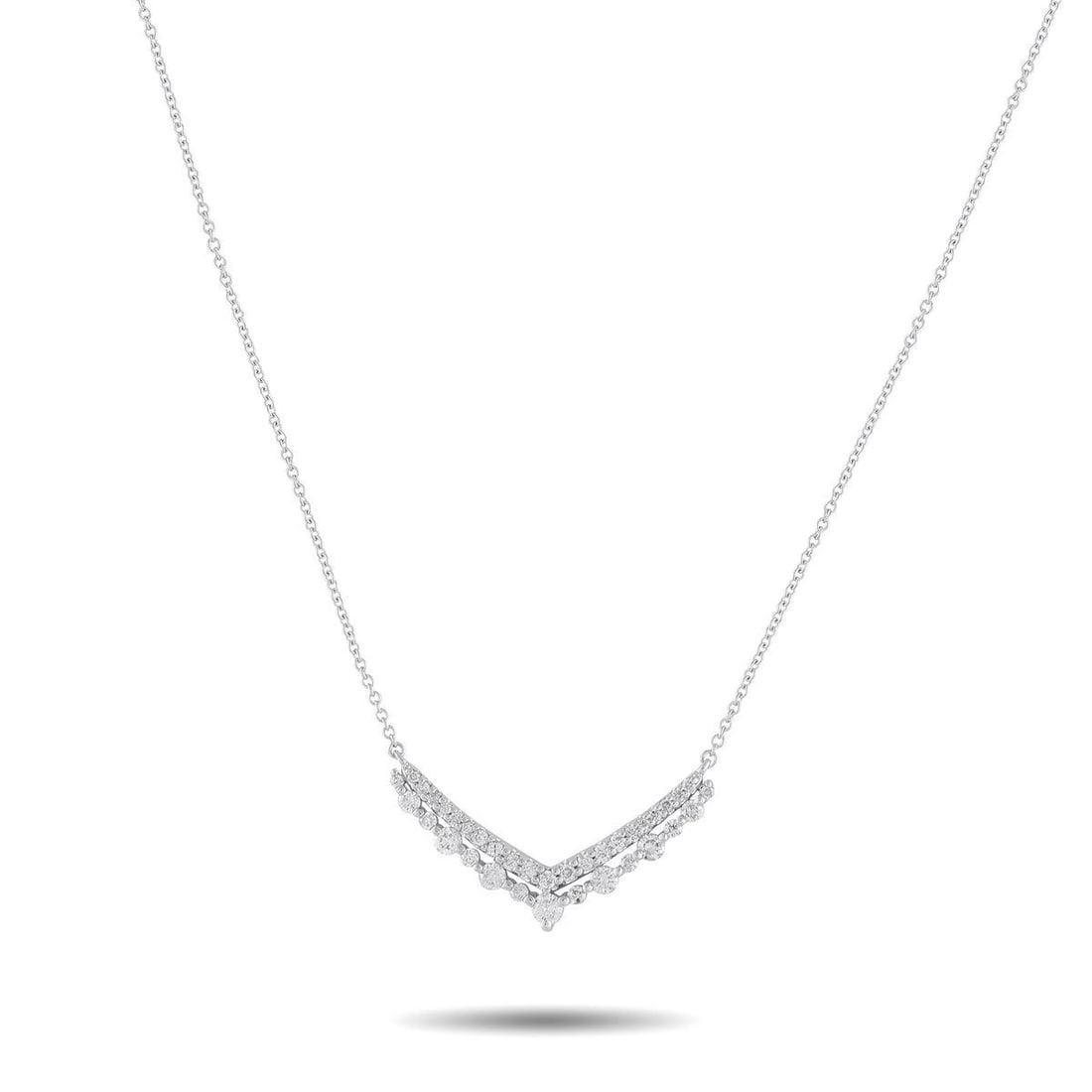 14K WHITE GOLD 0.50CT DIAMOND V PENDANT NECKLACE: In this piece, a fine white gold chain leads to a wide V-shaped pendant that draws the eye with its crisp, layered lines. The upper V is traced by tapering round diamonds held in double shared prongs,