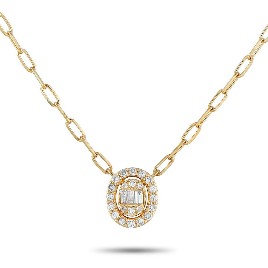 14K YELLOW GOLD 0.30CT DIAMOND CLUSTER OVAL HALO NECKLACE: This 14K yellow gold necklace presents a design that is effortless and light, yet deliberate and refined. It features a petite oval pendant with a cluster of round and baguette diamonds at its center.