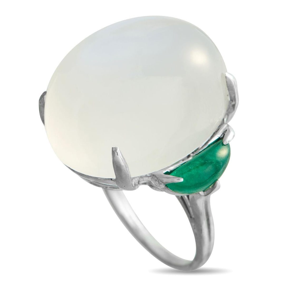 PLATINUM 2.20CT EMERALD AND MOONSTONE STATEMENT RING: Long tied to lunar symbolism, moonstones have a quiet pull that holds the eye. This platinum ring centers on a substantial 32.0 carat moonstone cabochon, its domed surface alive with shifting light. R