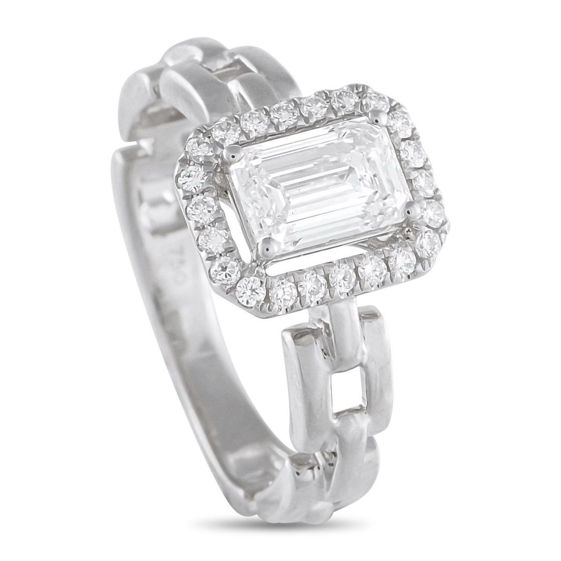 18K WHITE GOLD 1.25CT DIAMOND SQUARE LINK RING: This piece sets its 1.05-carat emerald-cut diamond center stone apart with intention. Four claw prongs hold the central gem high, leaving a slim gap before the halo of round diamonds begins. The space