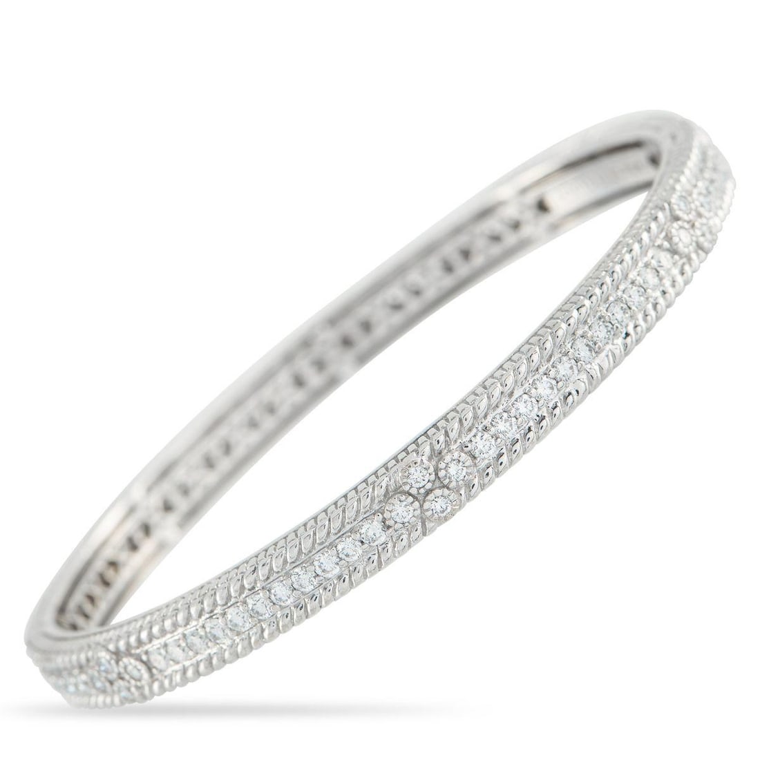 JUDITH RIPKA 18K WHITE GOLD 1.25CT DIAMOND BRACELET: This luxurious Judith Ripka bracelet will make any ensemble more impressive. The textured 18K White Gold setting is elevated by inset Diamonds totaling 1.25 carats, which add elegance to every movemen