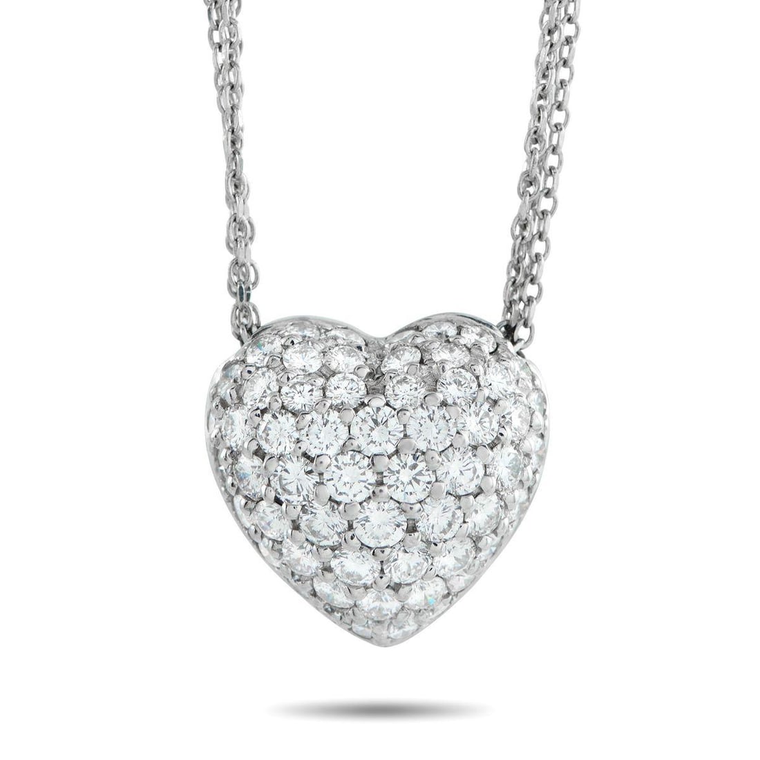 PLATINUM 1.65CT DIAMOND HEART NECKLACE: A necklace designed to reward closer inspection. This piece treats the heart not as a symbol alone, but as a form shaped by detail and intention. The heart pendant, pave set with diamonds, creates a c