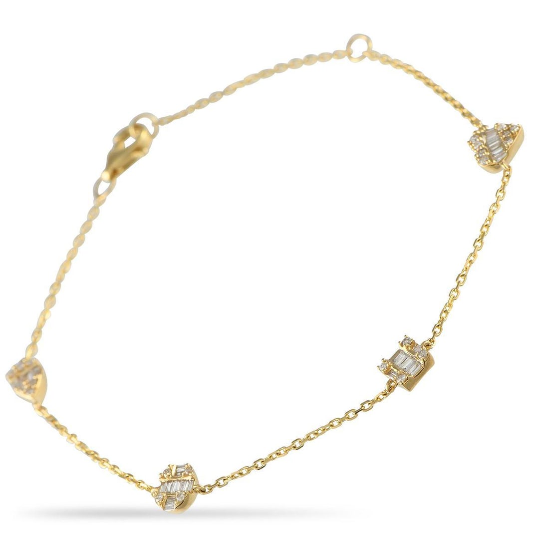 14K YELLOW GOLD 0.40CT DIAMOND STATION BRACELET: A series of geometric shapes add visual impact to this understated bracelet. Crafted from 14K Yellow Gold, the 7 chain shines to life thanks to Diamonds totaling 0.40 carats. Wear it alone or layer it