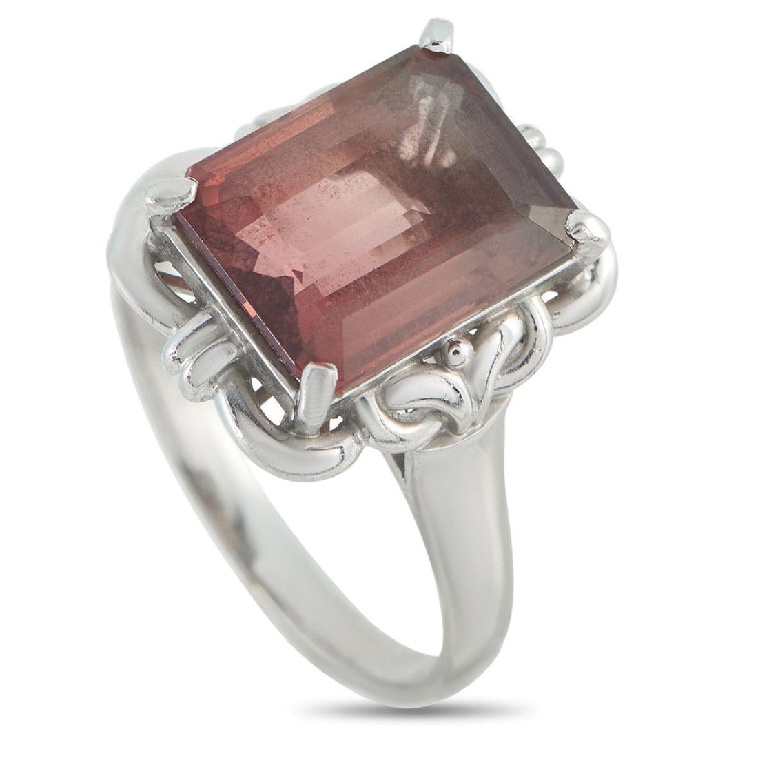 PLATINUM 5.01CT TOURMALINE RING: Detailed metalwork adds elegance to this impeccably crafted ring. Set in Platinum, this pieces 5.01 carat Tourmaline center stone makes it instantly captivating. A 2mm wide band and a 6mm top height m