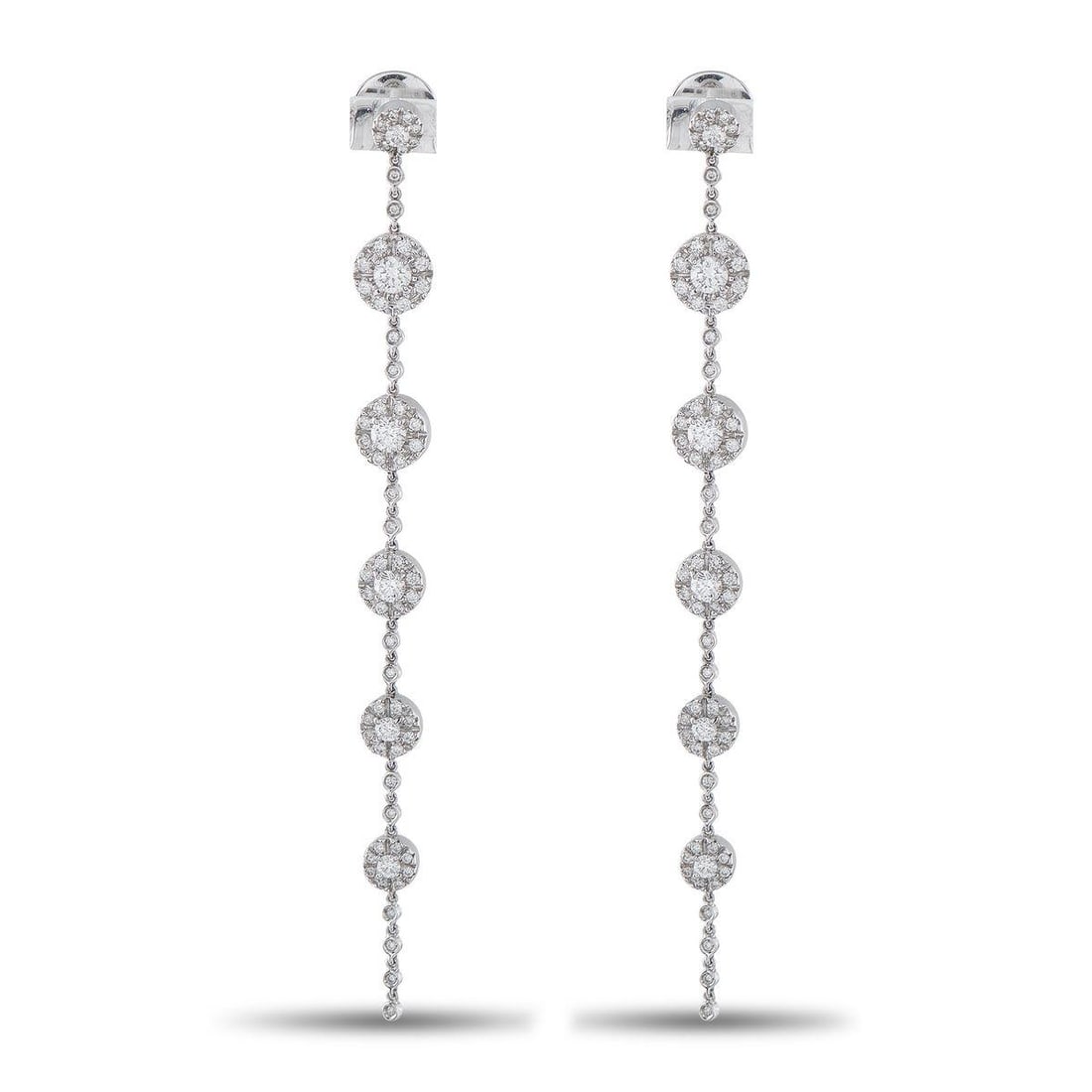 RABAT 18K WHITE GOLD 2.40CT DIAMOND LINE DROP EARRINGS: Crafted in white gold, these linear drop earrings by Rabat are defined by clean lines and subtle movement. Circular motifs are arranged in a vertical sequence, each set with a round diamond center and