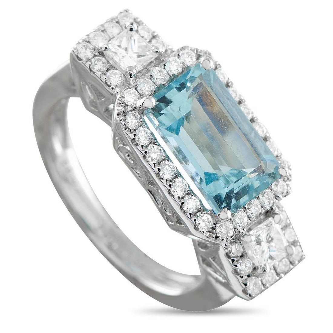 18K WHITE GOLD 0.75 CT DIAMOND AND AQUAMARINE RING: Sharp line, soft shine. This ring pairs the watery glow of aquamarine and the brilliance of diamonds with the clean lines of an east-west setting and step-cut geometry. A 2.33-carat aquamarine is set