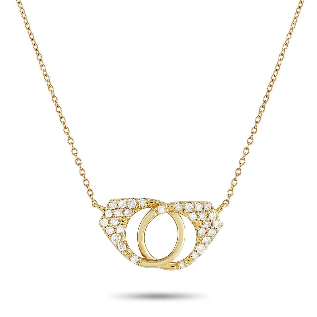 14K YELLOW GOLD 0.15CT DIAMOND HANDCUFF NECKLACE: Lock in a little sparkle with this 14K yellow gold handcuff-inspired necklace. The linked circles are in a polished finish, with pav diamonds on their wider parts. Held by a fine cable chain, this pie