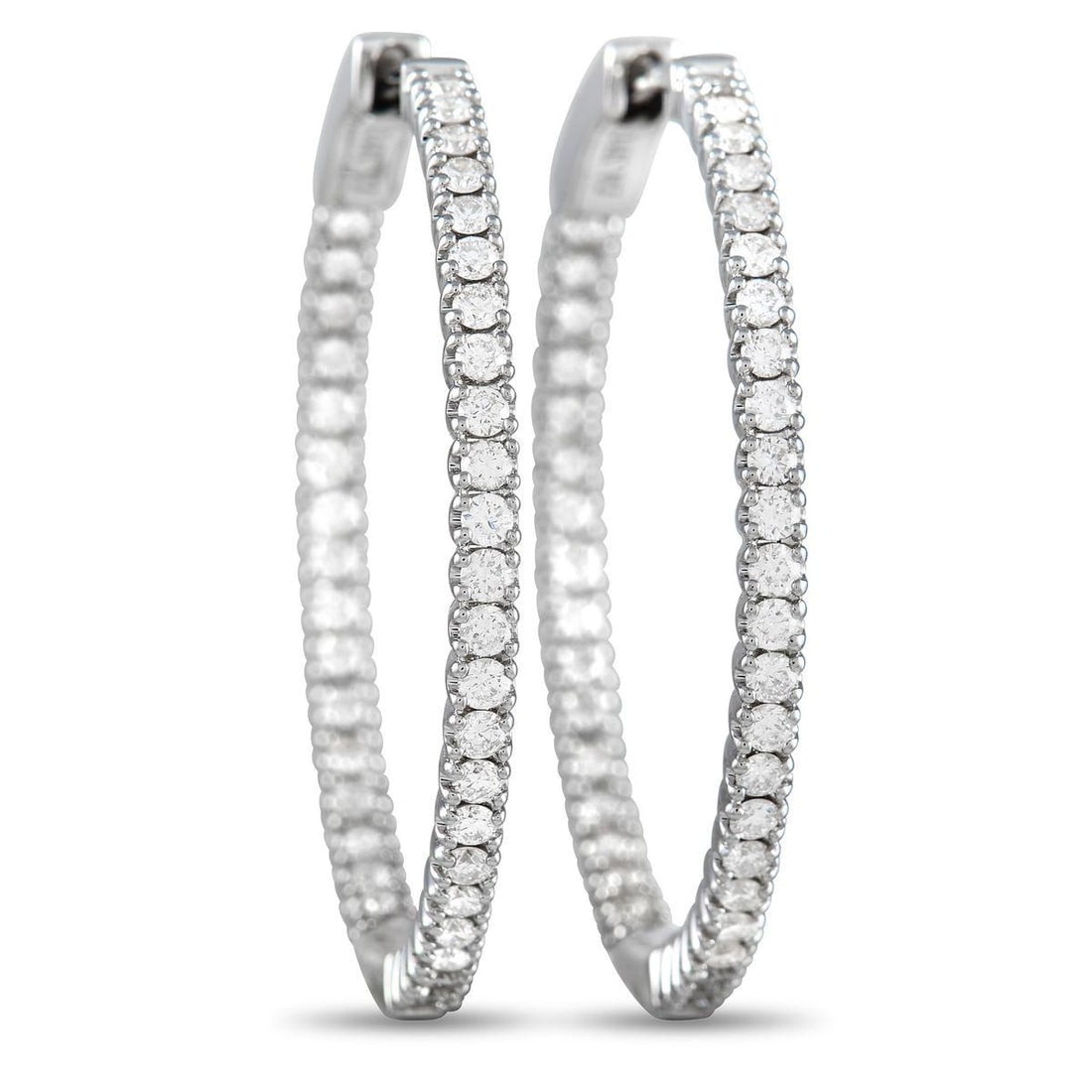 14K WHITE GOLD 0.98 CT DIAMOND INSIDE-OUT HOOP EARRINGS: Sleek and stylish, these 14K White Gold hoop earrings will never go out of style. The minimalist design allows their 0.98 carats of sparkling inset diamonds to take center stage. Each one measures 1.1