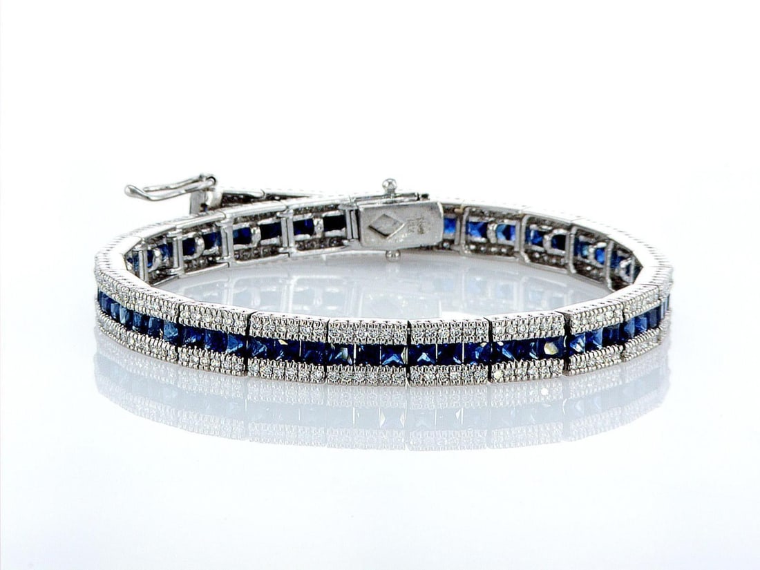 18kt White Gold 1.6ctw Diamond Tennis Bracelet: One 18k white gold bracelet "Tennis" (18k stamped), set with natural diamonds and diffusion sapphires. Jewelry Weight: 20.26Grs Total Diamonds Weight: 1.6Cts Main Stones Description: Quantity: 312 Cut