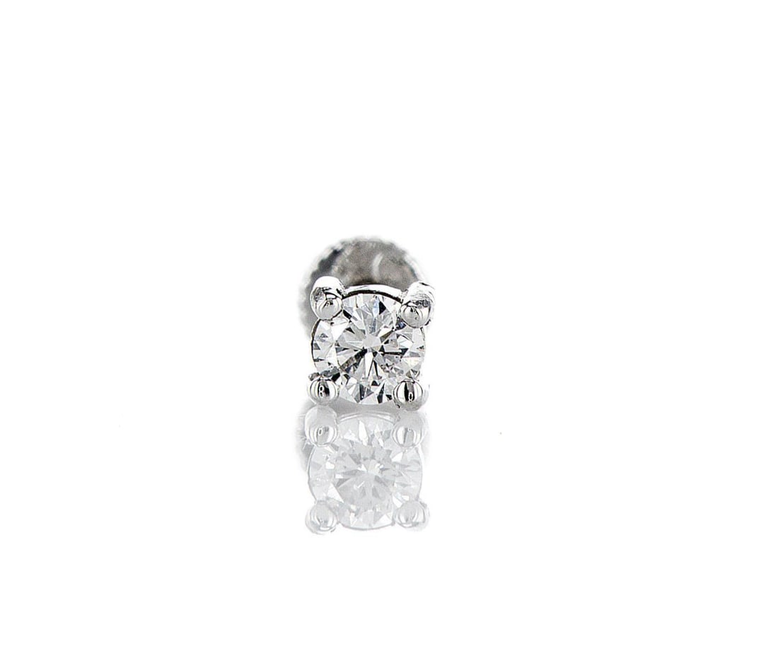 14kt White Gold 0.1ctw Diamond Earring: One 14k white gold earring, set with one lab grown diamond. Jewelry Weight: 0.3Grs Total Diamonds Weight: 0.1Cts Main Stones Description: Quantity: 1 Cut and shape: Round Brilliant Carats Weight: 0.1