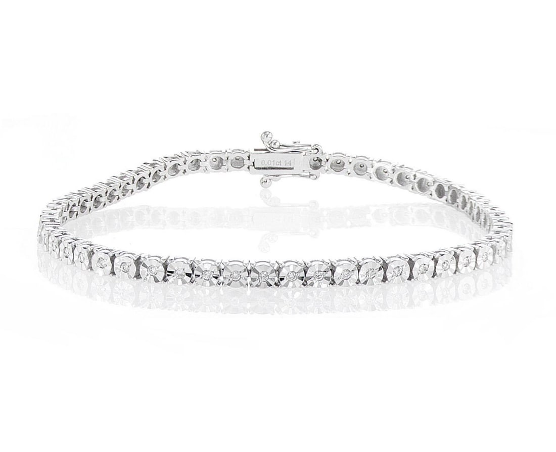 14kt White Gold 0.68ctw Diamond Bracelet: One 14k white gold bracelet, set with natural diamonds. Jewelry Weight: 10.4Grs Total Diamonds Weight: 0.68Cts Main Stones Description: Quantity: 54 Cut and shape: Round Brilliant Carats Weight: 0.68