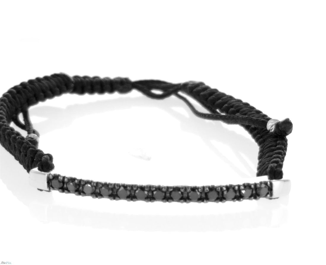 14kt White Gold 0.52ctw Diamond Bracelet: One 14k white gold bracelet "thread", set with 13 black diamonds. Jewelry Weight: 4.36Grs Total Diamonds Weight: 0.52Cts Main Stones Description: Quantity: 13 Cut and shape: Round Carats Weight: 0.52