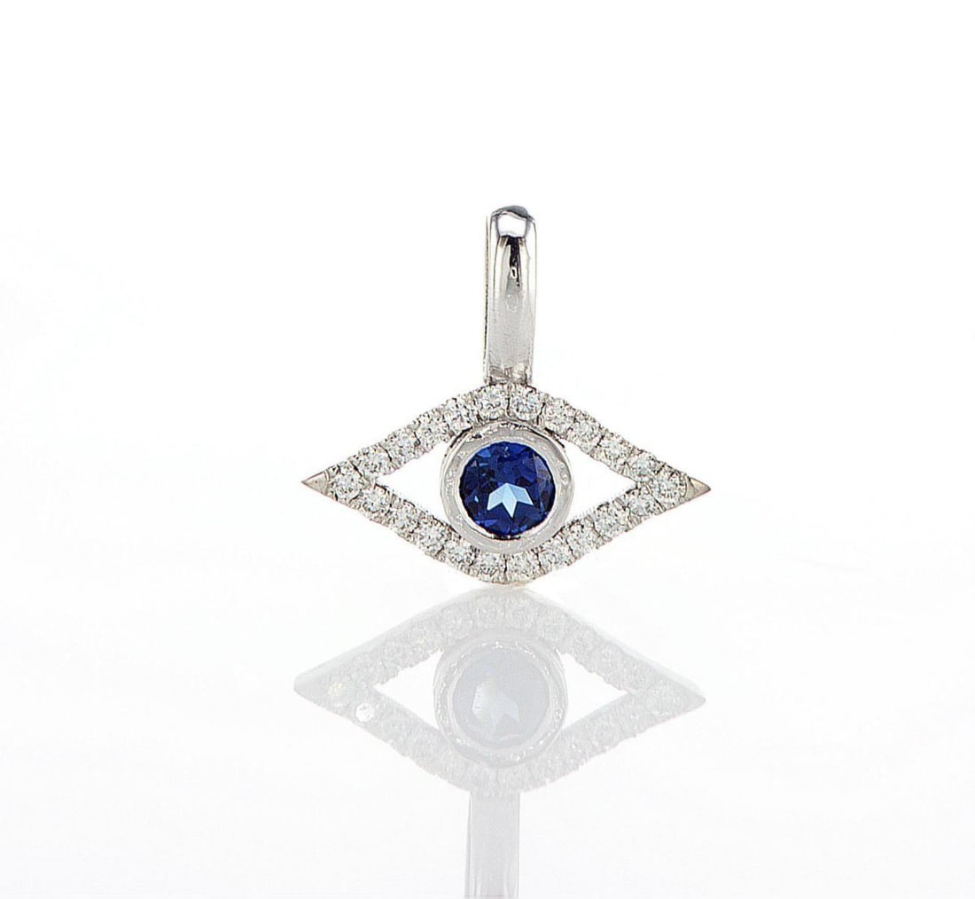 14kt White Gold 0.22ctw Diamond Pendant: Jewelry Description Description: One 18k white gold pendant, set with lab grown diamonds and lab grown sapphire. Jewelry Weight: 1.08 Grs Total Diamonds Weight: 0.22 Cts Precious Metal: 14kt White Gol