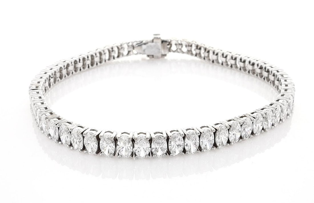 14kt White Gold 15.3ctw Diamond Bracelet: Jewelry Description Description: One 14k white gold bracelet, set with lab grown diamonds. Jewelry Weight: 16.1 Grs Total Diamonds Weight: 15.3 Cts Precious Metal: 14kt White Gold Certificate Number: