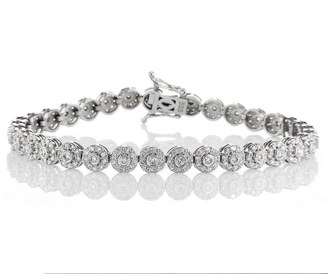 14kt White Gold 3.79ctw Diamond Bracelet: Jewelry Description Description: One 14k white gold bracelet, set with natural diamonds. Jewelry Weight: 11.9 Grs Total Diamonds Weight: 3.79 Cts Precious Metal: 14kt White Gold Certificate Number: DS