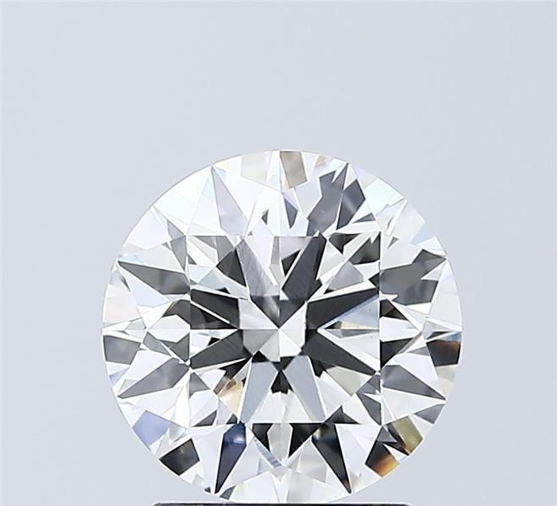 Lab Grown 2.03 ct, Color E/VVS2 IGI Graded Diamond: Lab/Natural Diamond: Lab Carat Weight: 2.03 Color Grade: E Clarity Grade: VVS2 Model: Round Fluorescence: N Polish: EXCELLENT Symmetry: EXCELLENT Depth: 62.2 Table: 57 Cut Grade: IDEAL Size: 8.06-8.11
