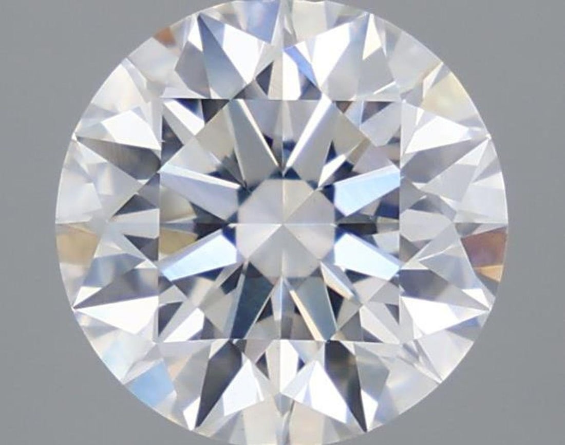 Lab Grown 2.05 ct, Color E/VS1 IGI Graded Diamond: Lab/Natural Diamond: Lab Carat Weight: 2.05 Color Grade: E Clarity Grade: VS1 Model: Round Fluorescence: None Polish: Excellent Symmetry: Excellent Depth: 59.7 Table: 60 Cut Grade: Ideal Size: 8.28-8.