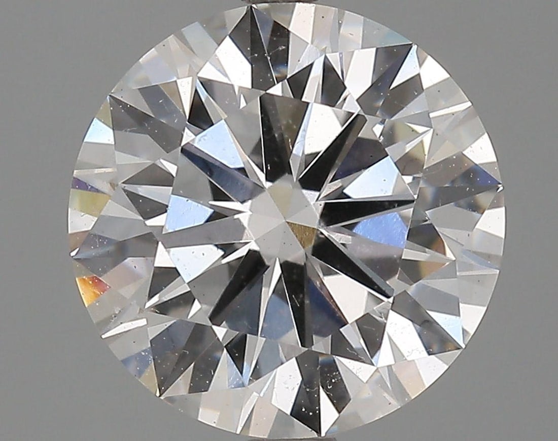 Lab Grown 3.29 ct, Color E/VS2 IGI Graded Diamond: Lab/Natural Diamond: Lab Carat Weight: 3.29 Color Grade: E Clarity Grade: VS2 Model: Round Brilliant Polish: Excellent Symmetry: Excellent Cut Grade: Ideal Size: 9.56 - 9.59 X 5.76 Certificate Number: